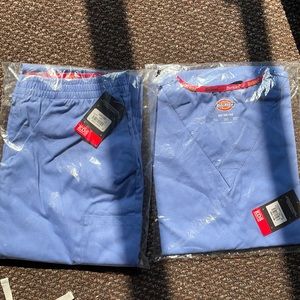 Brand new blue Dickies scrubs in size medium